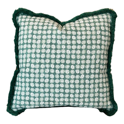 The Boheme Green Outdoor Pillow by Associated Design features a green and white geometric circular pattern with dark green textured trim, offering custom-made elegance and luxury crafted from the finest materials for any space.