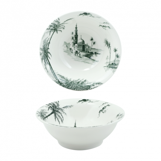 From Gien France’s Depareillees Vert Dinnerware and Serveware Collection, these two white ceramic bowls feature striking black-and-white scenes of palm trees, clouds, and a domed building with minaret—ideal for any table.