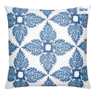 The John Robshaw Maira Indigo Outdoor Pillow features a white background with a symmetrical blue leaf pattern and a "NEW" label in the top right. Perfect for adding a fresh, relaxing vibe to your patio or beach setup.