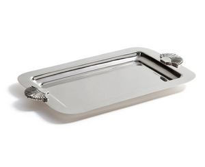 The Zodax Cap Ferrat Fan Shell Serving Tray features a rectangular silver design with raised edges and two shell-shaped handles, adding elegant French Riviera style to your gatherings.