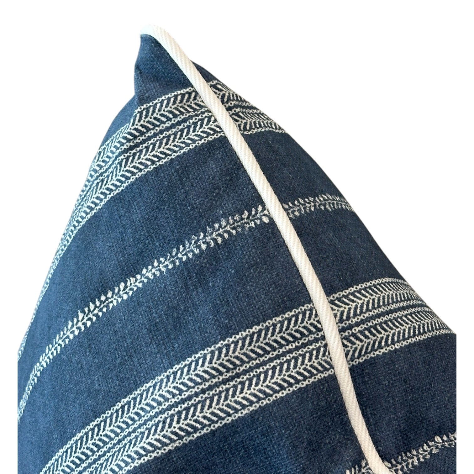 A close-up of the Orlando Stripe Outdoor Pillow by Associated Design, featuring blue fabric with white embroidered horizontal stripes and a crisp white piped edge, crafted from premium materials.