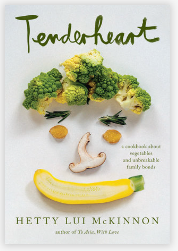 Cover of "Tenderheart" by Penguin Random House, designed with a creative face-like arrangement of fruits and vegetables, featuring a banana as the smile. Subtext: "A cookbook celebrating vegetarian recipes and everlasting family connections.