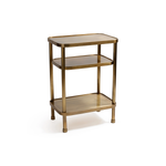 The Aman Etagere by Zodax is a compact, three-tiered brass side table with rounded edges and four legs, offering minimalist style inspired by an Etagere—perfect for display against a white backdrop.