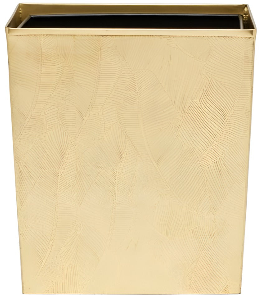 A square gold metal planter from Pigeon & Poodle’s Mancora Bath Collection, featuring a subtle textured leaf pattern, shiny brass finish, and black inner lining.