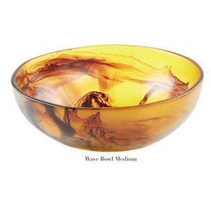 The "Tortoise Resin Serveware Collection" by Nashi Home features a medium glass bowl with an amber and brown swirl. Made from shatter-resistant resinware, it brings a sophisticated touch to your home decor.