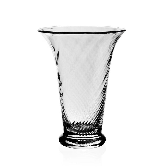 From the Waves Floral Vase Collection by William Yeoward Crystal, this clear glass vase features a flared rim and subtle spiral design, perfect for eye-catching floral displays. Shown here on a simple white background.