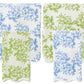 Two towels with blue floral patterns and two with green, all featuring a charming scallop trim, are part of the Weezie Towels x Meg Braff Bath Collection. This set from Weezie Towels perfectly captures Palm Beach’s spirited essence.