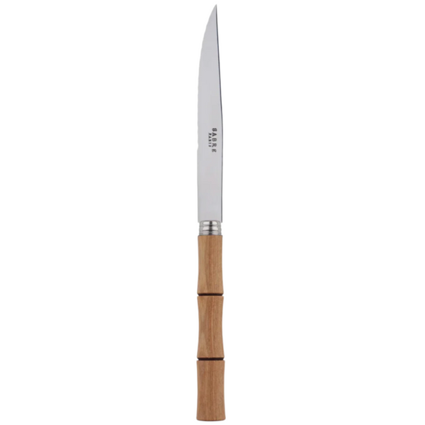 The Sabre Bamboo Steak Knife features a long, pointed stainless steel blade and a wooden handle designed to resemble bamboo.