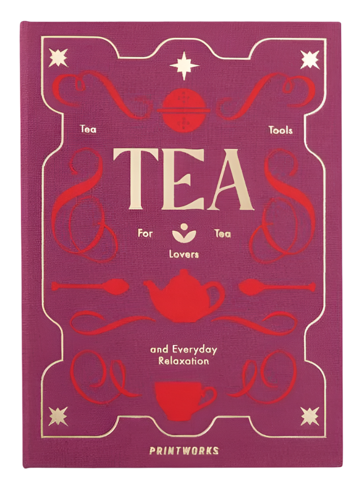 A pink "Tea Tool Set" book cover by PrintWorks features red and gold accents with teapots, cups, and the tagline "Tea Tools For Tea Lovers and Everyday Relaxation," plus guides on using a stainless steel tea infuser in your perfect kit.