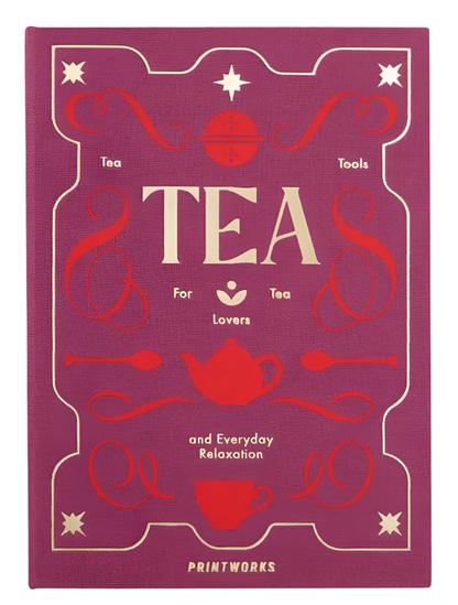 A pink "Tea Tool Set" book cover by PrintWorks features red and gold accents with teapots, cups, and the tagline "Tea Tools For Tea Lovers and Everyday Relaxation," plus guides on using a stainless steel tea infuser in your perfect kit.