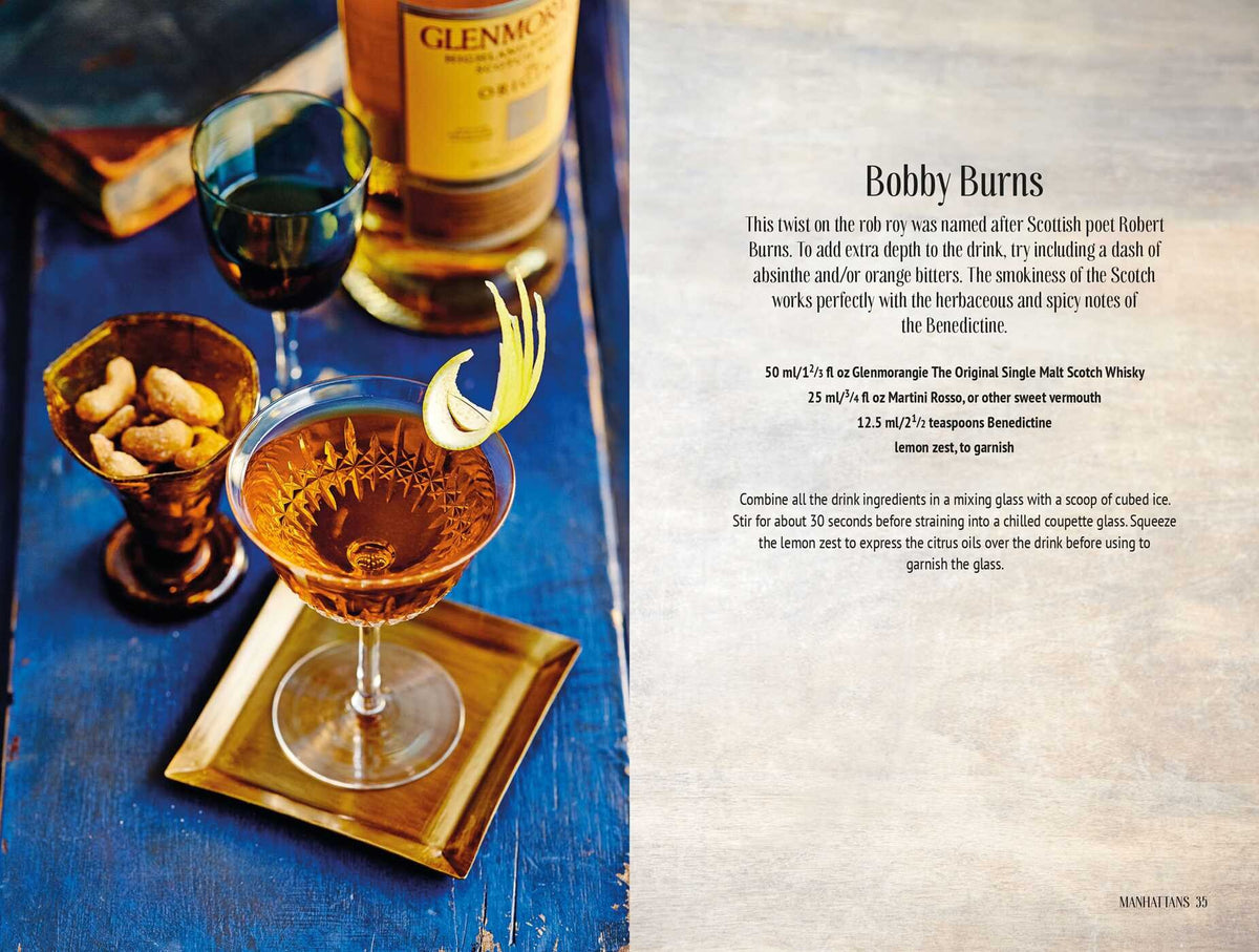 A cocktail garnished with a lemon twist rests on a gold tray beside a glass of nuts, accompanied by a bottle of Glenmorangie whisky and an extra glass, all arranged on a blue surface—ideal inspiration for anyone browsing Whiskey Cocktails from Simon & Schuster or searching for their next favorite whiskey recipe.