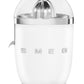 The Smeg Citrus Juicer Collection, by Smeg, offers a white juicer with metallic accents, a stainless steel anti-drip spout, and a clear dome lid.