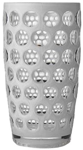 A clear glass tumbler from the Lente Acrylic Collection by Mario Luca Giusti with a textured pattern of raised, circular bumps covering its entire surface, perfect for outdoor entertaining.