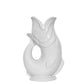The Original Gluggle Jug's Fish Gluggle Jug Collection features white ceramic fish-shaped jugs with open mouths and detailed scales and fins—a true icon of British design.