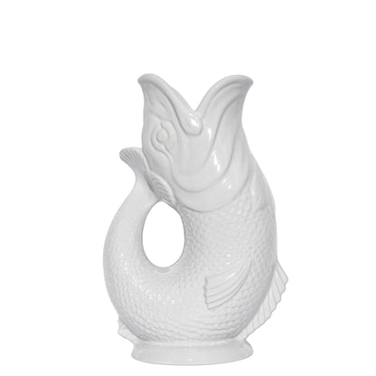 The Original Gluggle Jug's Fish Gluggle Jug Collection features white ceramic fish-shaped jugs with open mouths and detailed scales and fins—a true icon of British design.