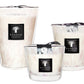 Three Baobab Collection Pearls White Candles in decorative glass containers, varying slightly in size and design.