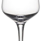 A clear, handblown wine glass from the Vintner Drinkware Collection by Simon Pearce, featuring a tall stem and wide base, is shown empty against a plain white background.