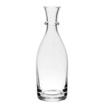 The Whitney Tall Carafe by William Yeoward Crystal is a clear glass piece with a narrow neck and wide base, shown standing upright on a white background.