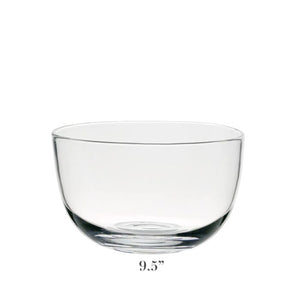 The Whitney Deep Bowl from William Yeoward Crystal is a clear, rounded glass serving bowl displayed on a white background. Ideal as a centrepiece, this elegant bowl measures 9.5 inches in diameter.