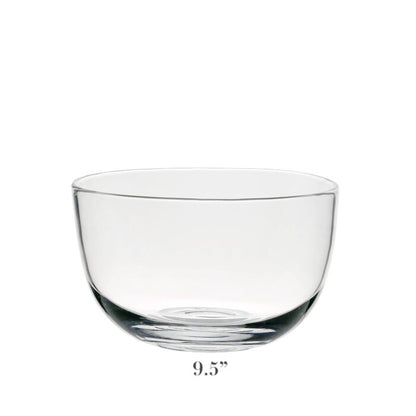 The Whitney Deep Bowl from William Yeoward Crystal is a clear, rounded glass serving bowl displayed on a white background. Ideal as a centrepiece, this elegant bowl measures 9.5 inches in diameter.