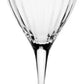 The Corinne Collection wine glass by William Yeoward Crystal features a long stem, round base, and vertical optic for subtle sophistication, shown clear and empty against a plain white background.