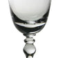 The Fanny Clear Collection wine glass by William Yeoward Crystal features a decorative beaded stem, a round base, and a classical bowl design, shown empty against a white background.