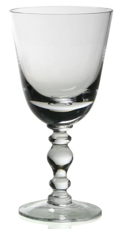 The Fanny Clear Collection wine glass by William Yeoward Crystal features a decorative beaded stem, a round base, and a classical bowl design, shown empty against a white background.