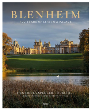 Rizzoli's "Blenheim: 300 Years of Life in a Palace" book cover highlights the majestic Blenheim Palace with its striking baroque architecture framed by a serene lake and vibrant autumn trees, celebrating English heritage.