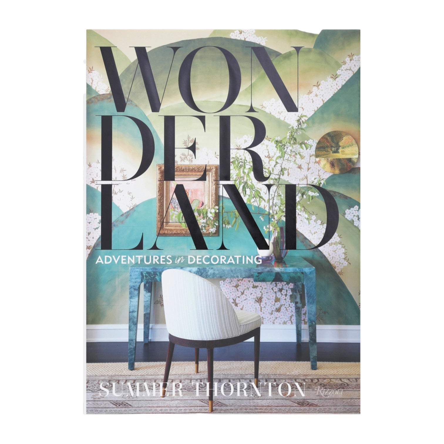 Book cover of Wonderland Adventures in Decorating by Rizzoli, an inspiring interior design book showcasing green-themed maximalist decor with a chair, turquoise desk, and floral accents in the background.