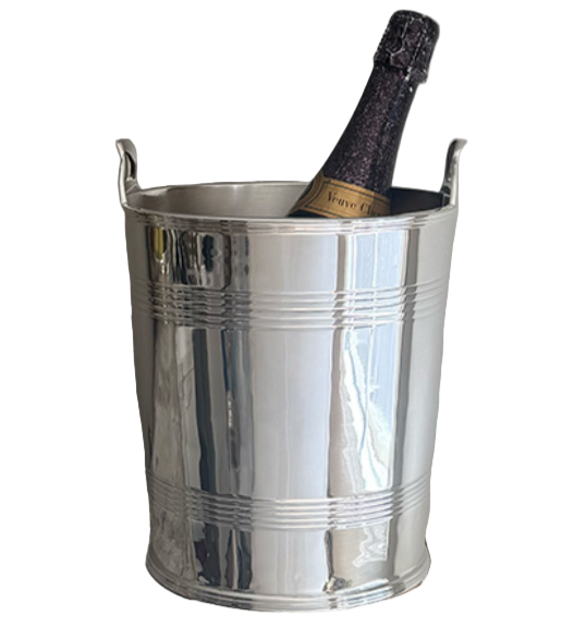 A bottle of champagne rests in a Hôtel Silver Vintage Champagne Bucket with Ribbed Bands and two handles, set against a plain white background.