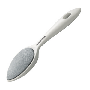 The Tweezerman Sole Smoother Antibacterial Callus Stone features a white handle and gray abrasive surface, offering effective foot exfoliation for smooth, refreshed skin. The brand name "Tweezerman" appears on the handle.