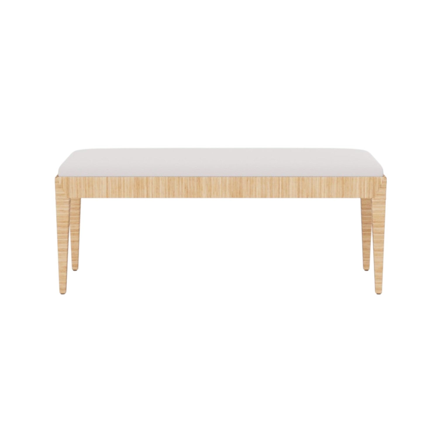 The Wren Bench by Made Goods features a rectangular white rattan frame, light wood legs, and a white cushioned seat in high performance fabric, shown against a plain white background.