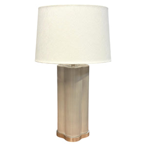 The Hwang Bishop Stratus Classic Table Lamp features a beige, flower-shaped base and a white fabric drum shade, creating an elegant lighting choice for any room.