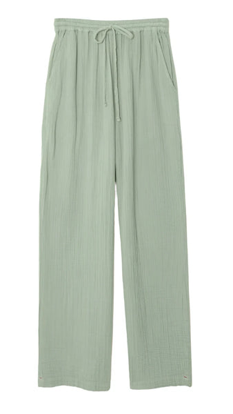 The Xirena Dylan Pant by Xirena features light green, straight-leg design with an elastic drawstring waist and two side pockets, crafted from double-faced cotton gauze.