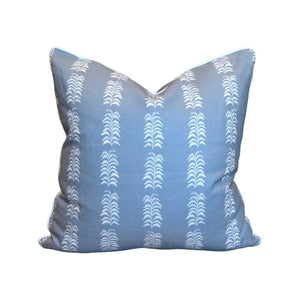 The HIVE Petite Frond Blue Pillow features a white, repeating vertical geometric pattern and is crafted from premium materials for lasting comfort, shown against a plain white background.