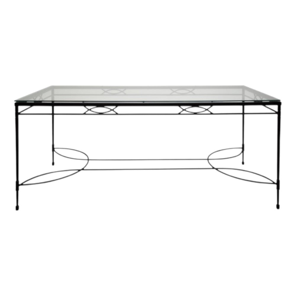The Amalfi Glass Top Dining Table in Slate by Janus et Cie features a sleek glass top, black metal frame, and minimalist base design—an elegant addition to the Amalfi lounge and dining collection.