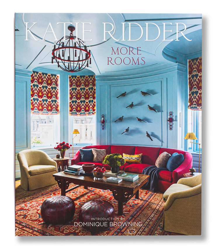 The cover of "More Rooms" by Vendome features Katie Ridder’s inventive décor: blue walls, patterned shades, a red sofa, yellow chairs, and wall-mounted bird sculptures—perfect inspiration for design lovers.