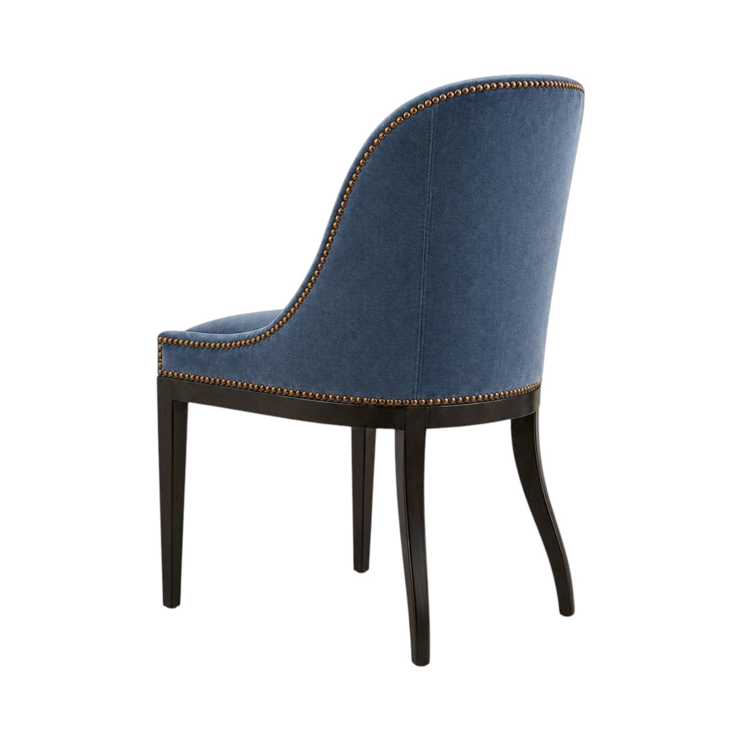 The Maurice Armless Chair by Sherrill/Mr & Mrs Howard features blue upholstery, a curved backrest, dark wooden legs, and brass nailhead trim, shown from the back.