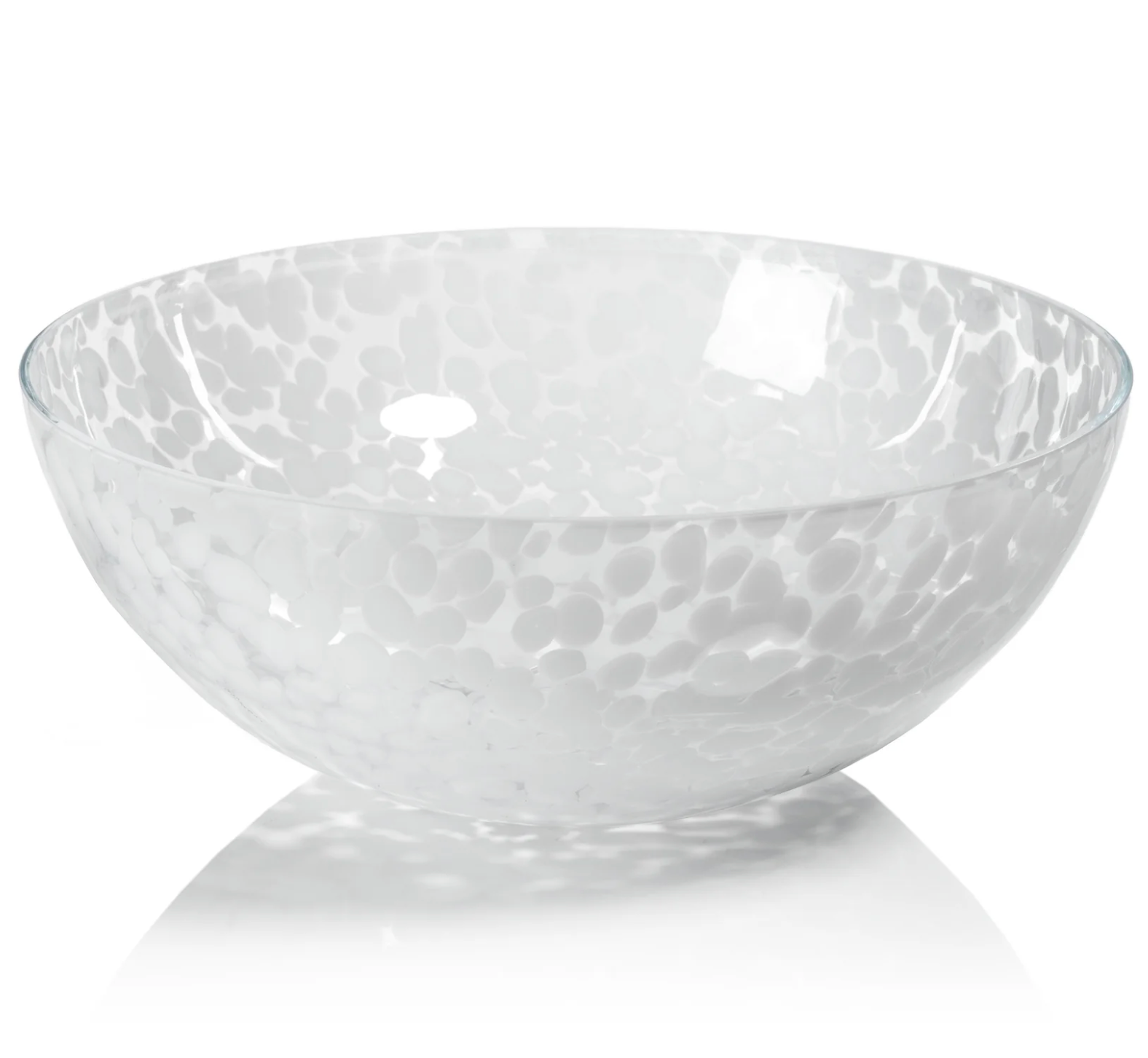 The Liguria Confetti Bowl by Zodax is a white glass bowl with a dappled pattern and subtle reflections, making it an elegant glass accent for sophisticated interiors.