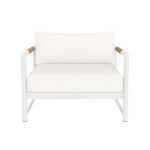 The HARBOUR OUTDOOR Breeze XL Lounge Chair in White Panama Blanco features a cushioned seat and backrest, sturdy aluminum frame, and solid teak armrest accents, shown against a white background.