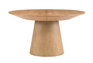 The Discus Extendable Dining Table by Sherrill/Mr & Mrs Howard features a wide, flat round top and a thick, tapered cylindrical natural wood base, shown against a white background for a modern look.