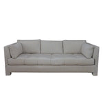 The Highland House Barrett Sofa in Ticking Stripe Dove features a modern light gray upholstery with three seat cushions, three back cushions, straight arms, and two cylindrical side pillows, bringing effortless coastal charm to any space. Subtle ticking stripe accents enhance its timeless appeal.
