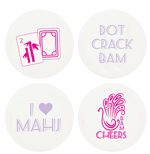 Haute Papier’s Mahjong Coasters: set of 4 round, recycled chipboard coasters with card symbols and fun phrases like "DOT CRACK BAM," "I ♥ MAHJ," and "BAM CHEERS"—a unique hostess gift for mahjong lovers.