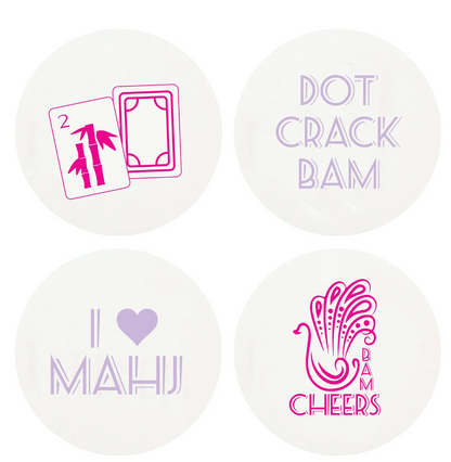 Haute Papier’s Mahjong Coasters: set of 4 round, recycled chipboard coasters with card symbols and fun phrases like "DOT CRACK BAM," "I ♥ MAHJ," and "BAM CHEERS"—a unique hostess gift for mahjong lovers.