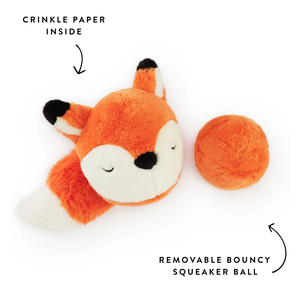 The Foggy Dog Fox 2-in-1 Bounce Dog Toy is a plush orange fox designed for engaging playtime, featuring crinkle paper in the head and tail. Shown beside its separate, removable bouncy ball squeaker, the text highlights both the crinkle paper inside the fox toy and the detachable bouncy squeaker ball for added interactive fun.