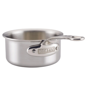 The Thomas Keller Commercial Clad Stainless Steel Butter Warmer by Hestan features a sturdy handle and metal brand plate—an ideal pick for anyone seeking environmentally conscious cookware.