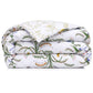 Folded white organic cotton sateen duvet cover from the Botanic Bedding Collection, featuring a colorful botanical print of green vines, orange berries, and small birds.