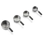 The Cuisinart Magnetic Measuring Cups set includes four stainless steel cups of different sizes, displayed in a row from largest to smallest on a white background.