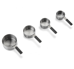 The Cuisinart Magnetic Measuring Cups set includes four stainless steel cups of different sizes, displayed in a row from largest to smallest on a white background.