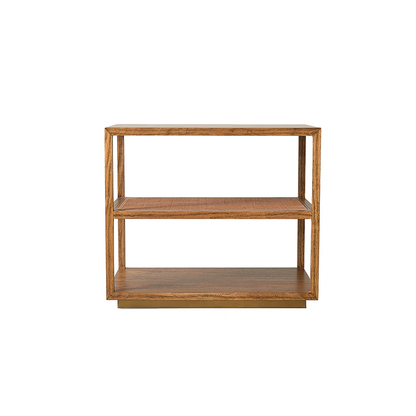 Rectangular Orca Side Table by Julian Chichester with three open shelves, featuring an antiqued rattan shelf, viewed from the front against a plain white background.